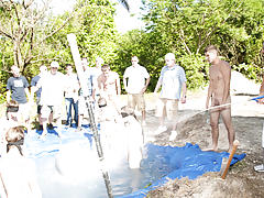 these poor pledges had to play blind folded in this aperture in the ground filled with water group skinny dipping wel